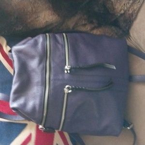 Oryany back pack. Never used. Leather w/top handle. 15x12 beautiful leather NWOT